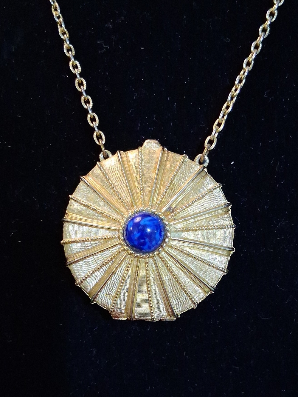 Gold-Tone Radiant Sunburst Necklace with Blue Cabochon
